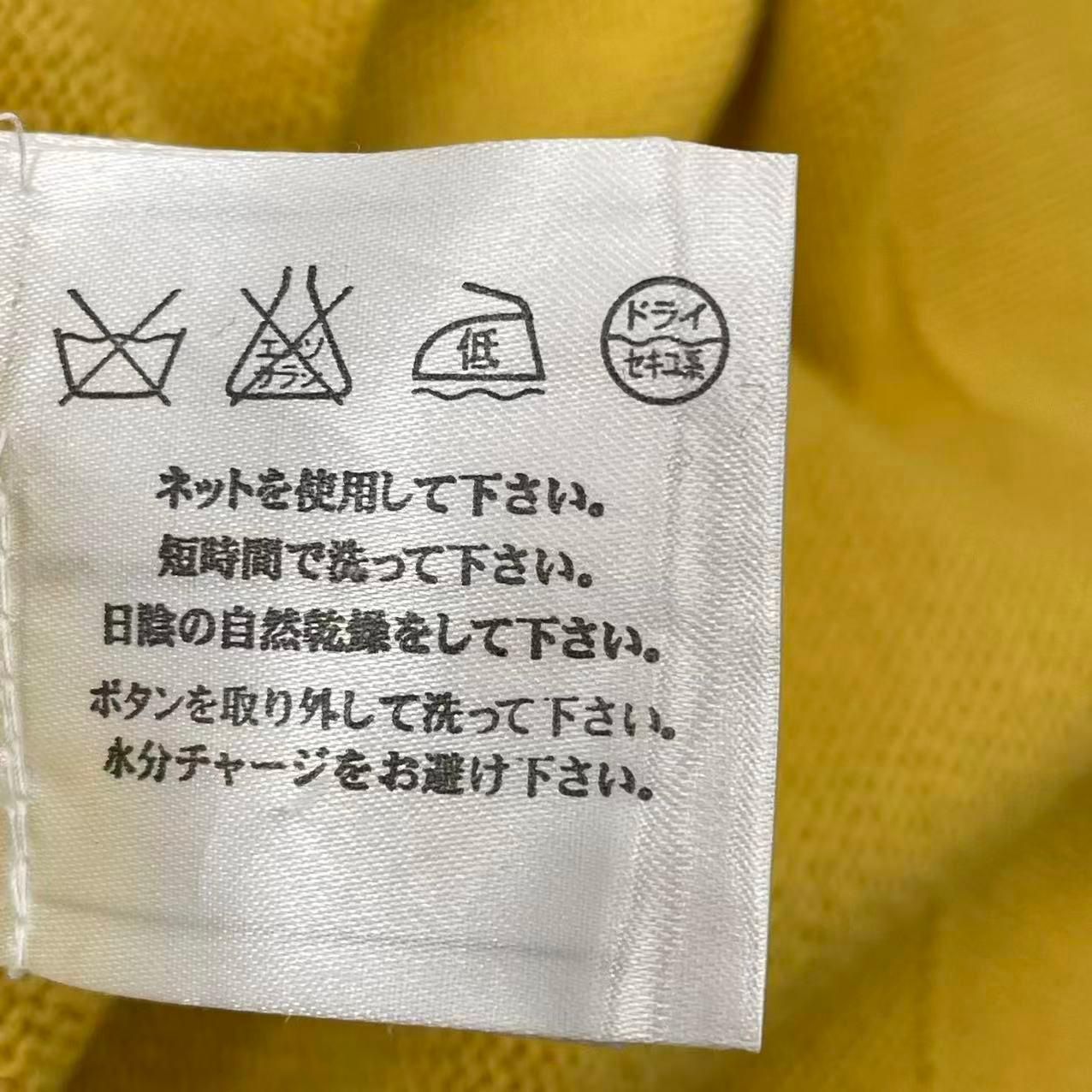 新品同様 CHANEL シャネル セーター 2010年 METIERS D'ART 上海コレクション ロゴ ココボタン ココマーク カシミヤ サイズ38 イエロー 新品同様 CHANEL シャネル セーター 2010年 METIERS D'ART 上海