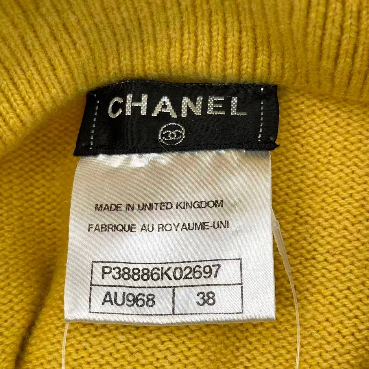 新品同様 CHANEL シャネル セーター 2010年 METIERS D'ART 上海コレクション ロゴ ココボタン ココマーク カシミヤ サイズ38 イエロー 新品同様 CHANEL シャネル セーター 2010年 METIERS D'ART 上海