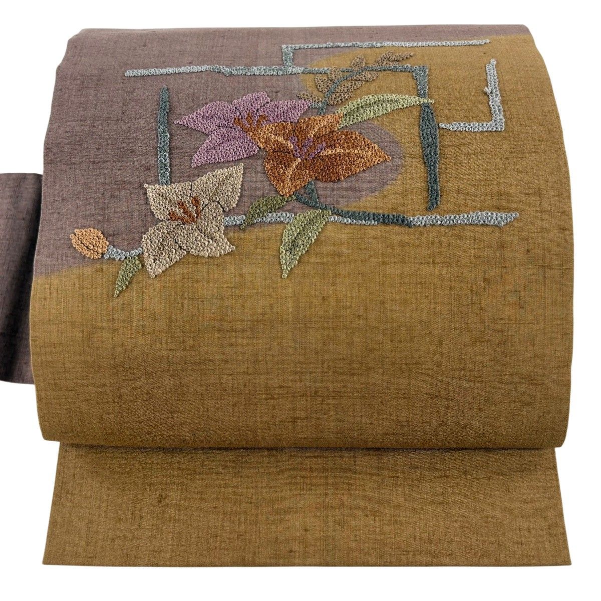 美品】 名古屋帯 秀品 紬地 草花 霞 相良刺繍 染め分け 山吹茶色 正絹