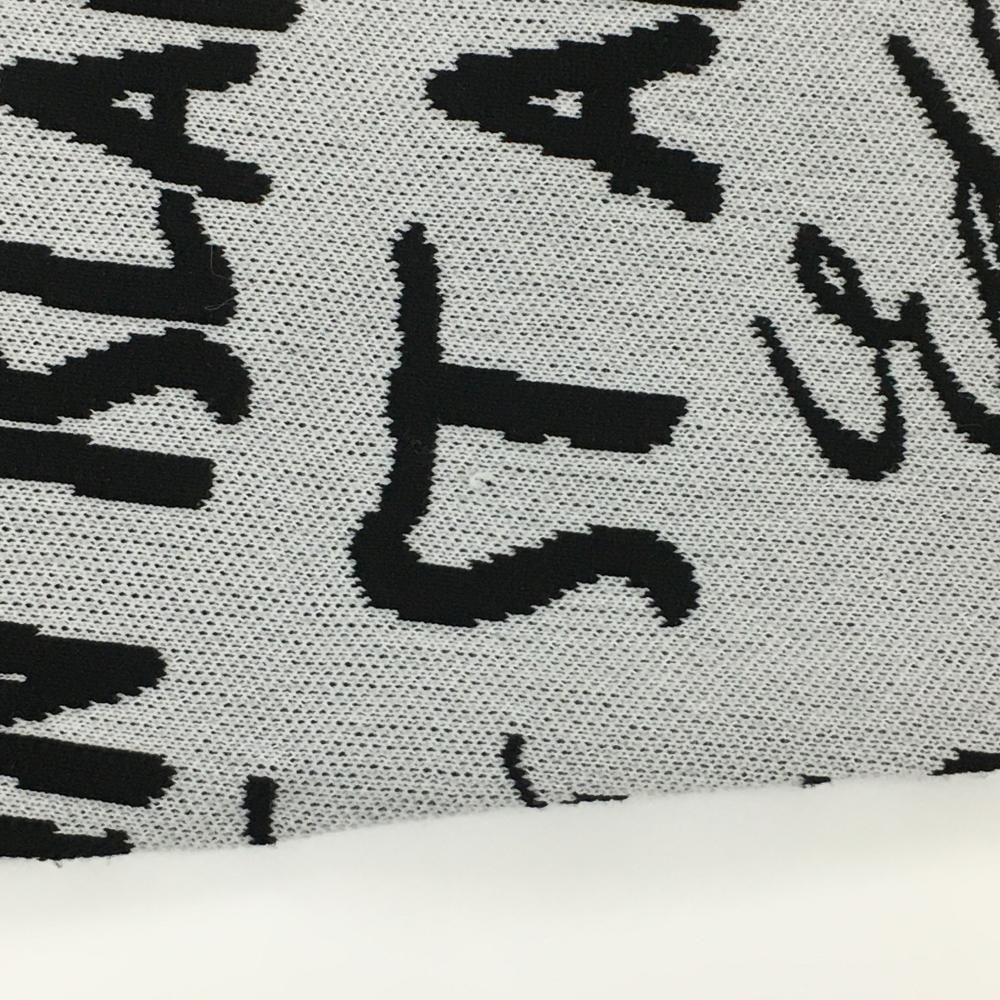 美品】セントアンドリュース セーター 白系×黒 英字ロゴ総柄 ニット