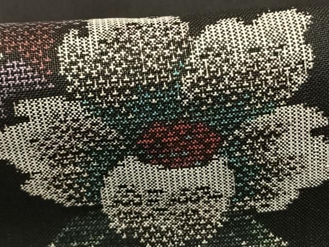 平和屋着物○本場大島紬 カタス9マルキ 草花文 黒地 正絹 逸品