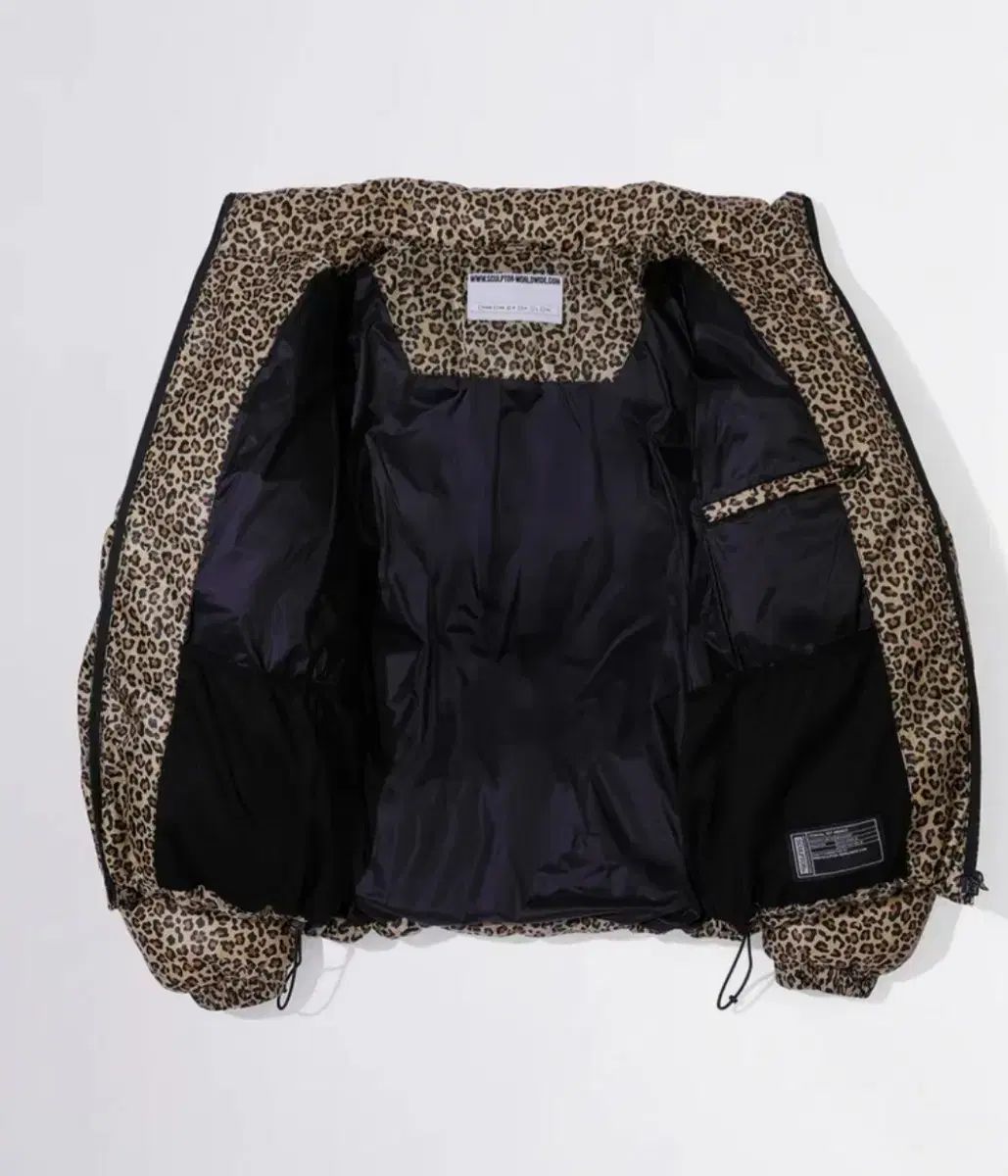 SCULPTOR ヒョウ柄 ダウン アウター - メルカリ