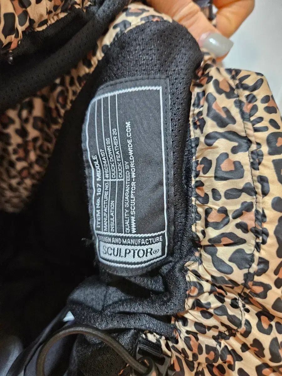 SCULPTOR ヒョウ柄 ダウン アウター - メルカリ