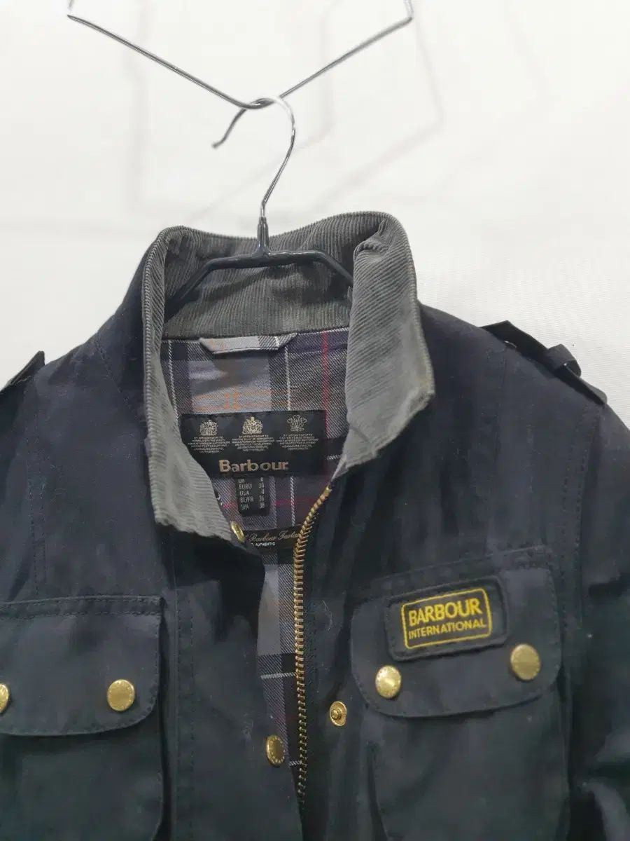 バブアー インターナショナル ベルト付き ブラック ジャケット - メルカリ