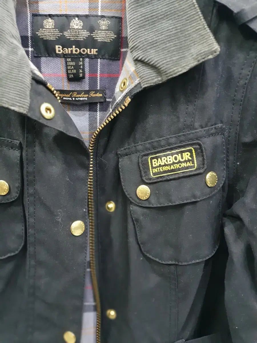 バブアー インターナショナル ベルト付き ブラック ジャケット - メルカリ