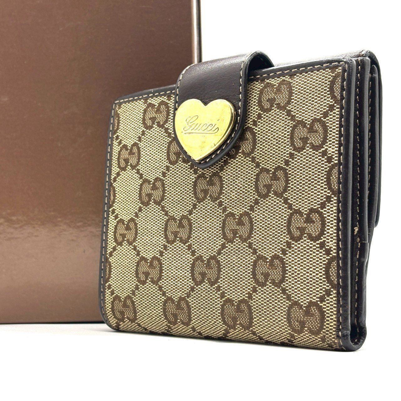 遊び心を、控えめに】 GUCCI 二つ折り財布 GGキャンバス ラブリー