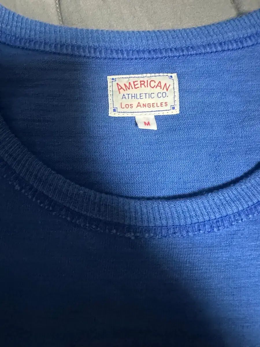 M The REAL McCOY’S ザ・リアルマッコイズ ロゴTシャツ