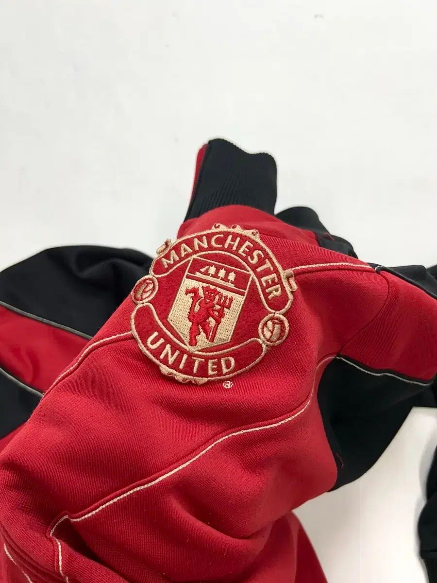 NIKE マンチェスター ユナイテッド トラックジャージ バイカラー