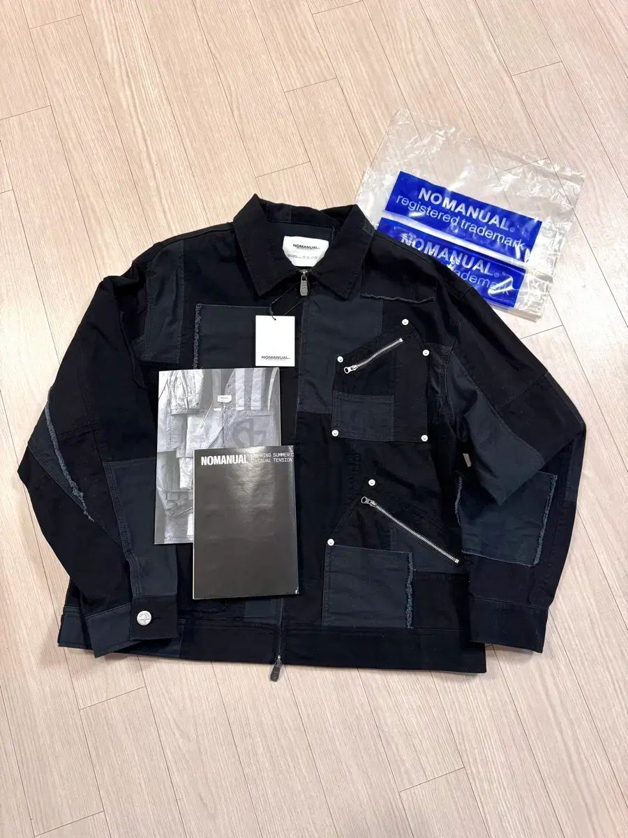 新品/L ノーマニュアル トラッカージャケット