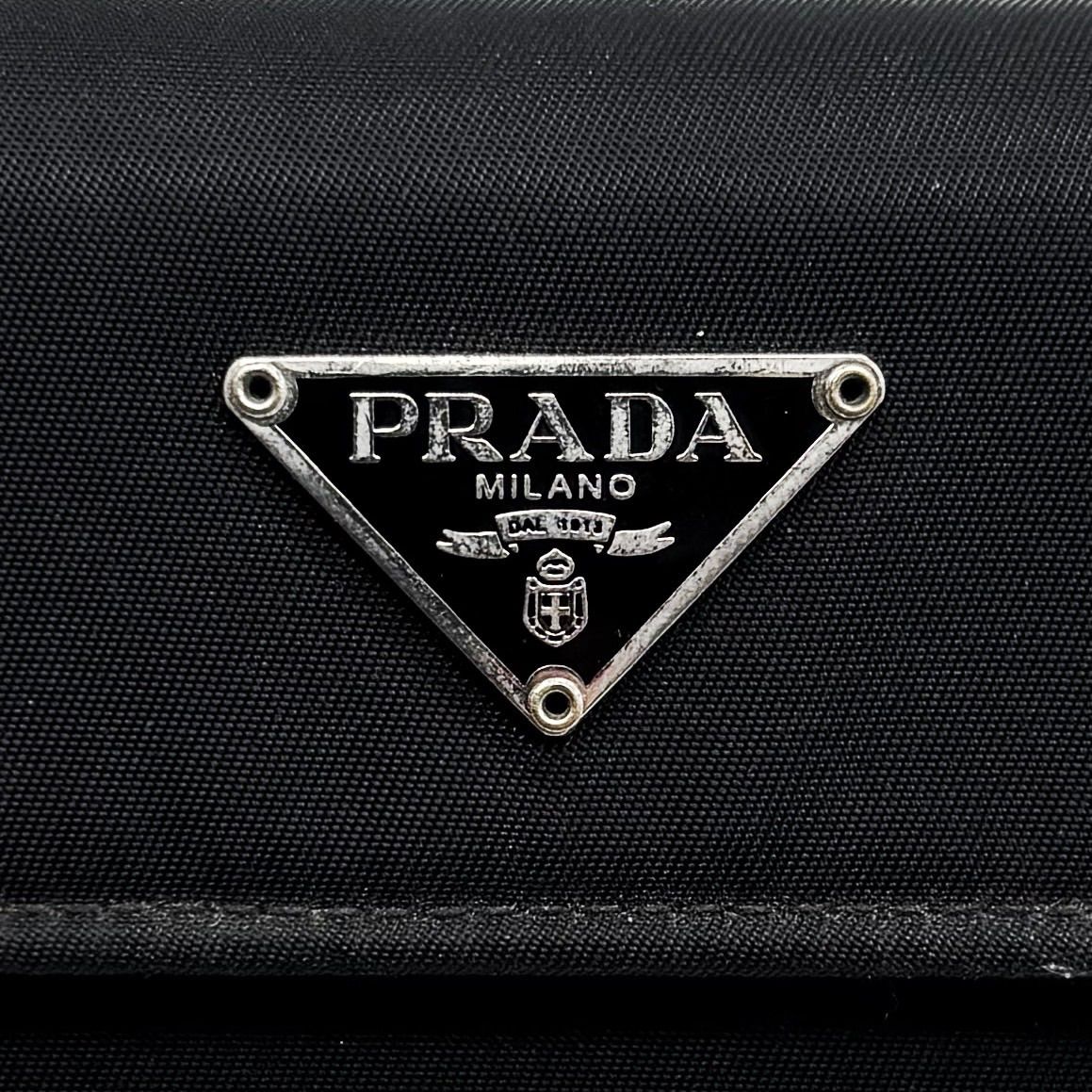 良品】PRADA プラダ 三つ折り財布 コンパクトウォレット 三角プレート