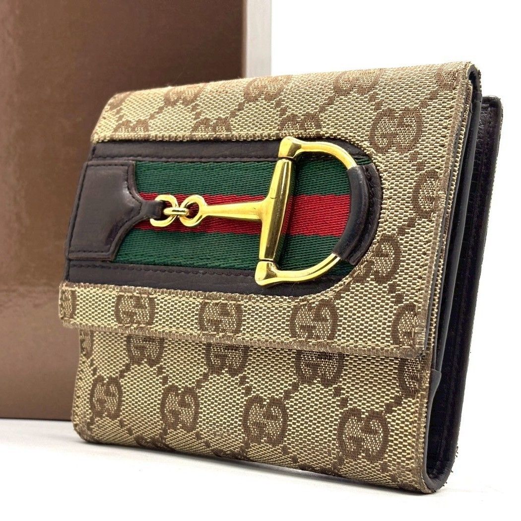 定番に、品格を】 GUCCI 二つ折り財布 GGキャンバス ホースビット