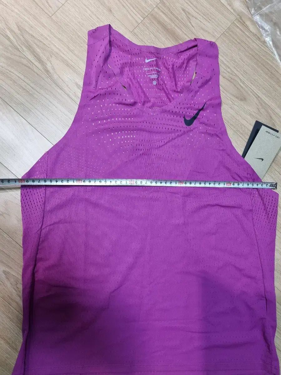 ナイキ adv エアロ スイフト シングレット フューシャ L - メルカリ