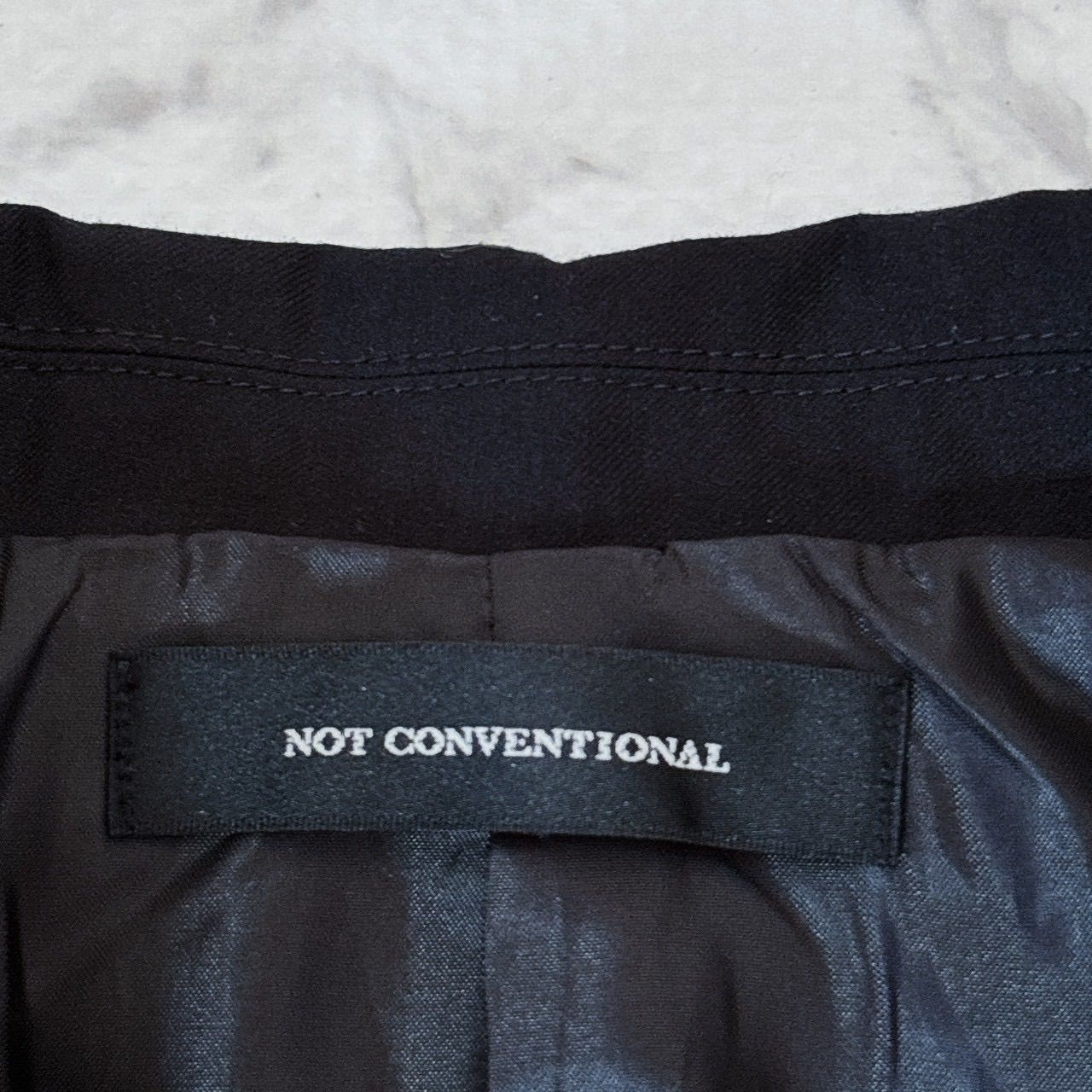 not conventional norfolk jacket ジャケット ベルトデザイン 