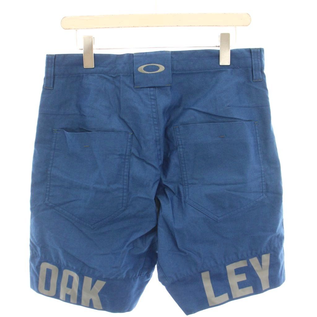 オークリー OAKLEY ショートパンツ ハーフパンツ 34 青 ブルー 無地