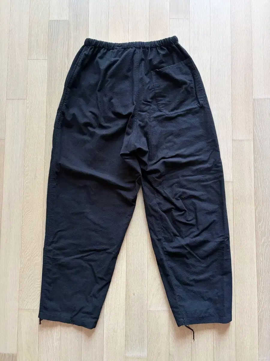 comoli 25AW コットンネル テーパード パンツ - メルカリ