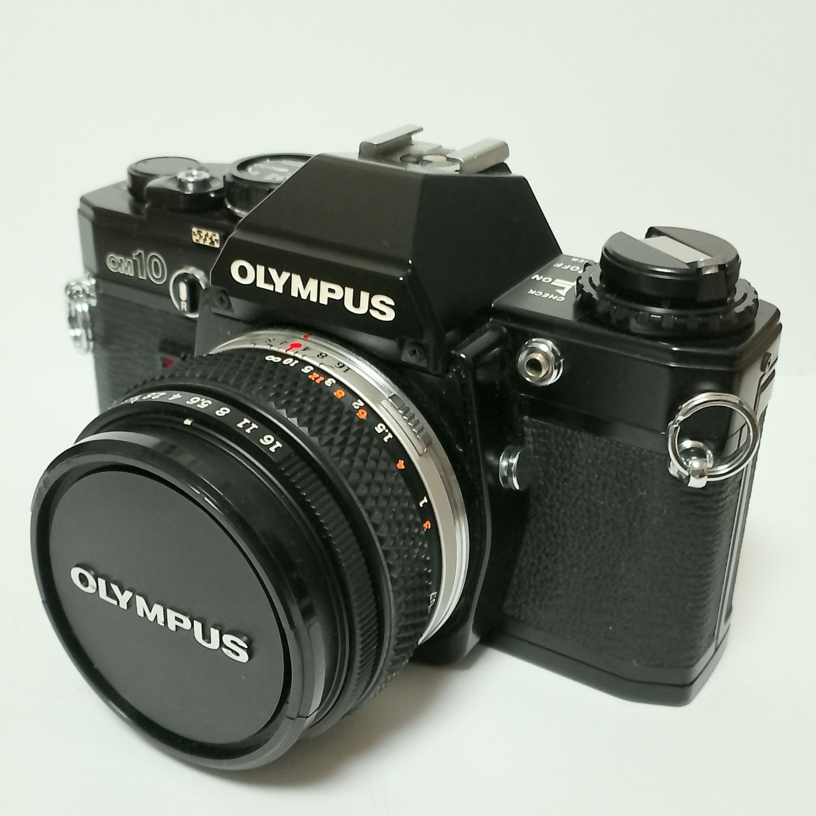 OLYMPUS OM-10 フィルム一眼レフカメラ + ZUIKO レンズ付き - メルカリ