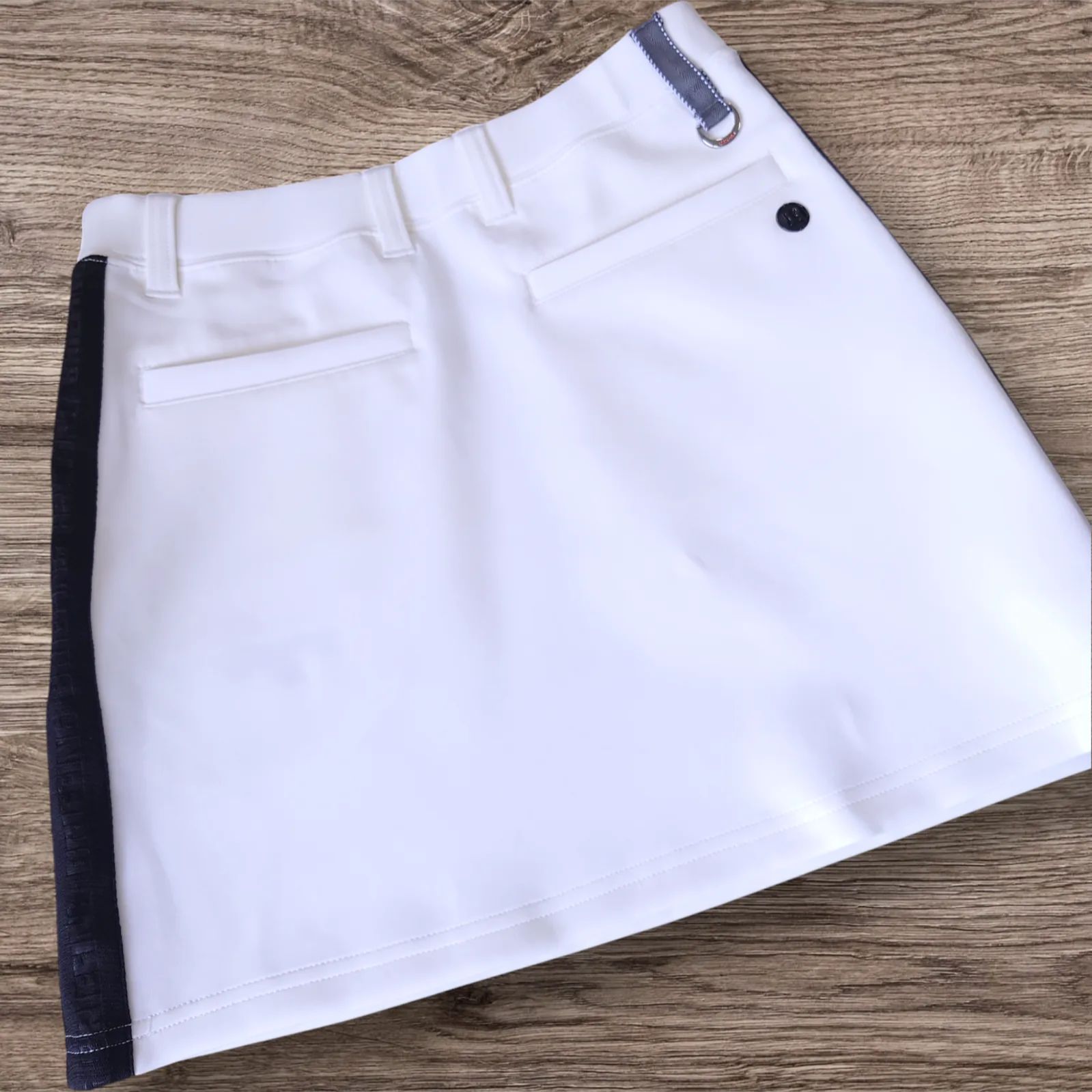 極美品 BRIEFING GOLF ボンディングスカート ロゴテープ ホワイト