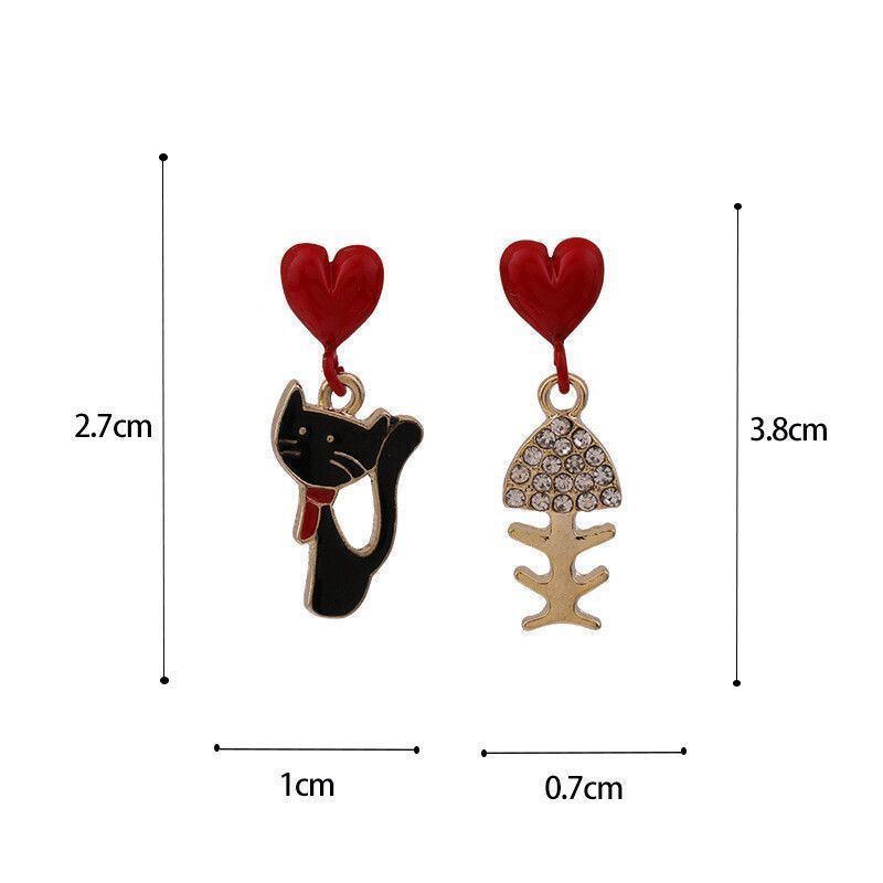 ☆ 猫ピアス ねこ お魚 骨 ゆらゆら 揺れる アシンメトリー かわいい