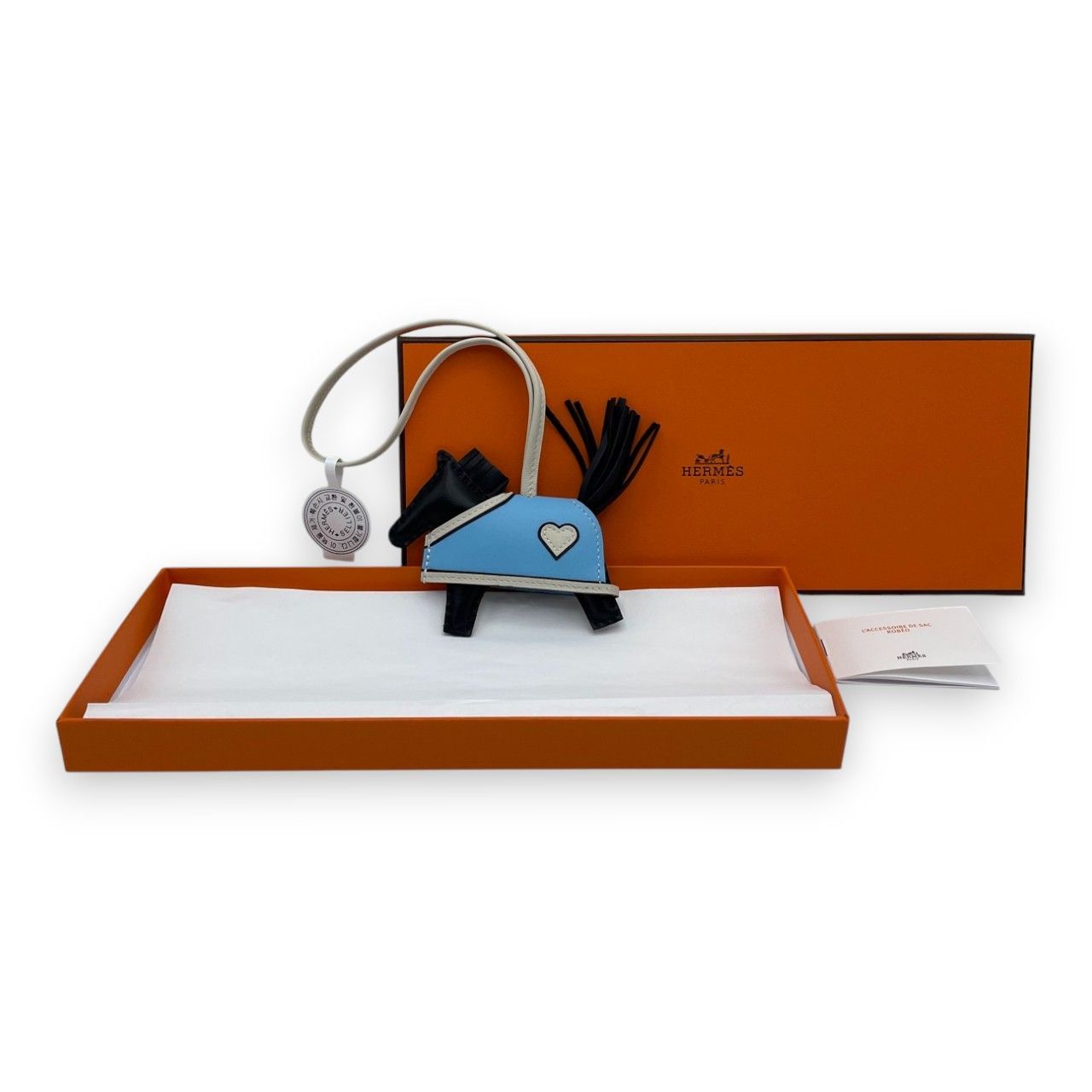 エルメス ロデオチャーム ロベオクール PM ノワール/クレ/セレステ K