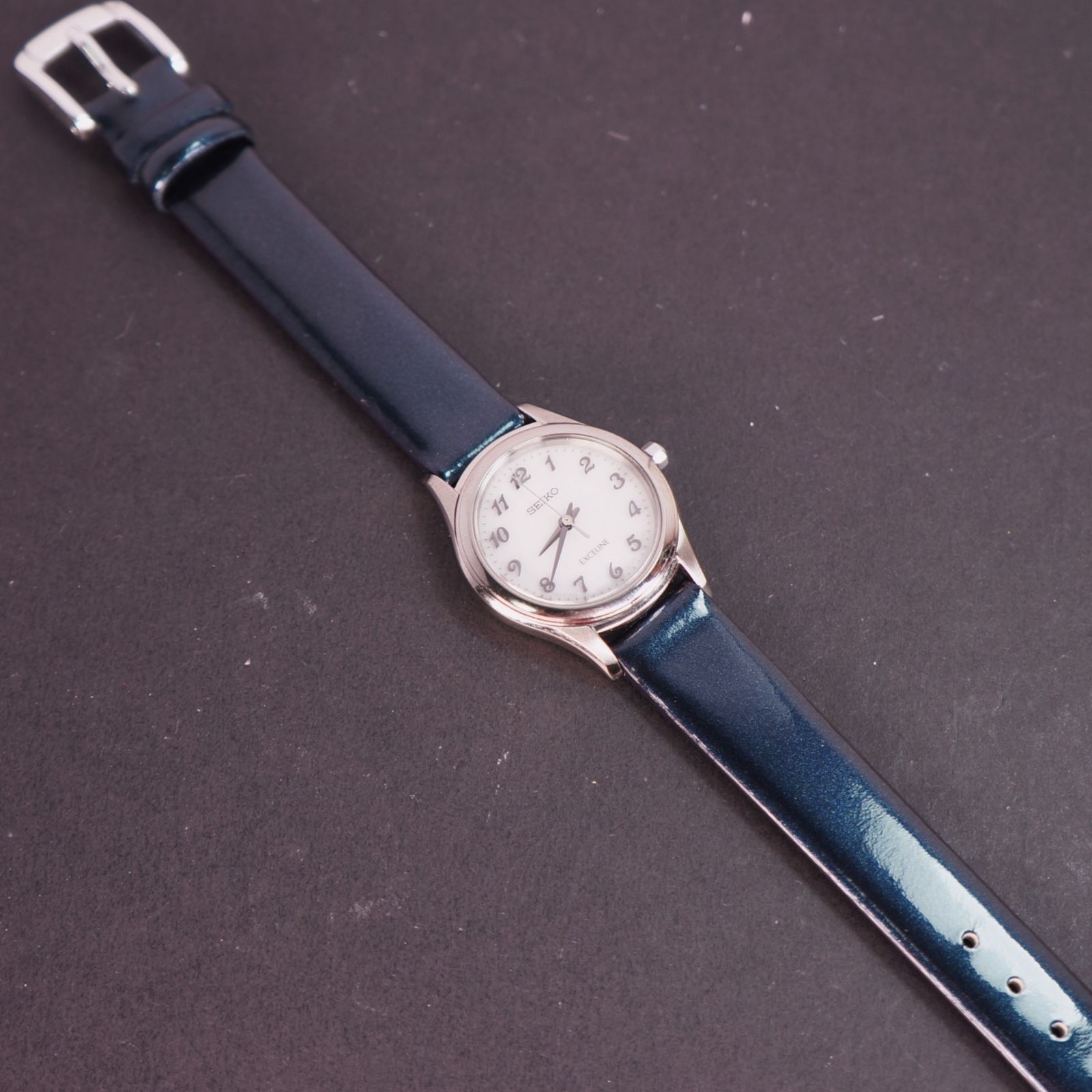 【電池交換済】SEIKO　EXCELINE　腕時計　シェル文字盤　新品ベルト 稼働品】SEIKO EXCELINE 白文字盤 ソーラー腕時計 新品ベルト - メルカリ