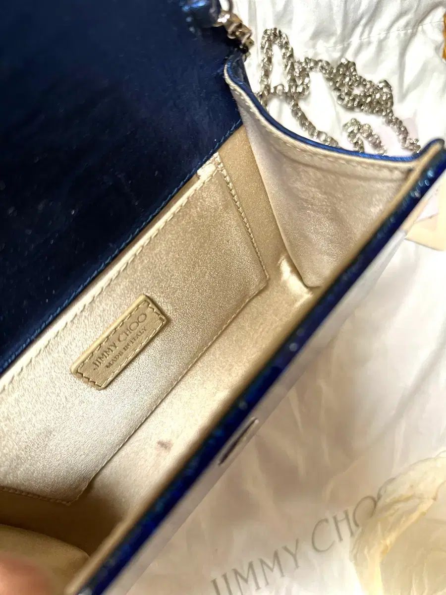 ジミーチュウ グリッター ブルー クラッチバッグ - メルカリ