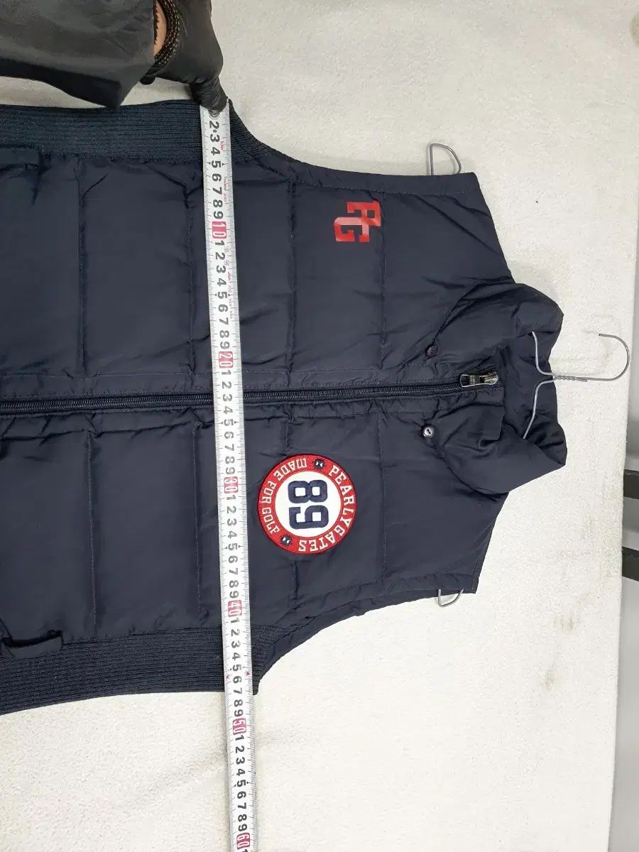 パーリーゲイツ 軽量 ダウン ベスト ネイビー 2 - メルカリ