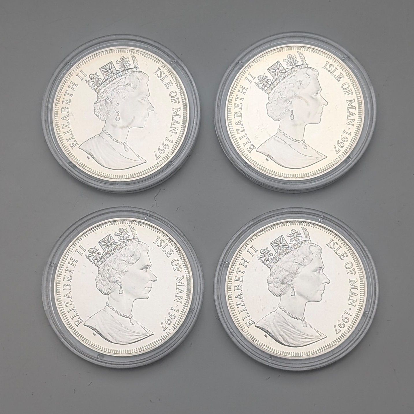 引き猫様限定　　一分銀　銀製 旧貨幣 セット４枚組 英国マン島 クラウン銀貨 猫の​歴史シリーズ：4枚セット PobjoyMint