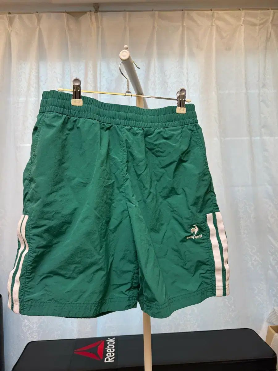 le coq sportif グリーン ハーフパンツ - メルカリ