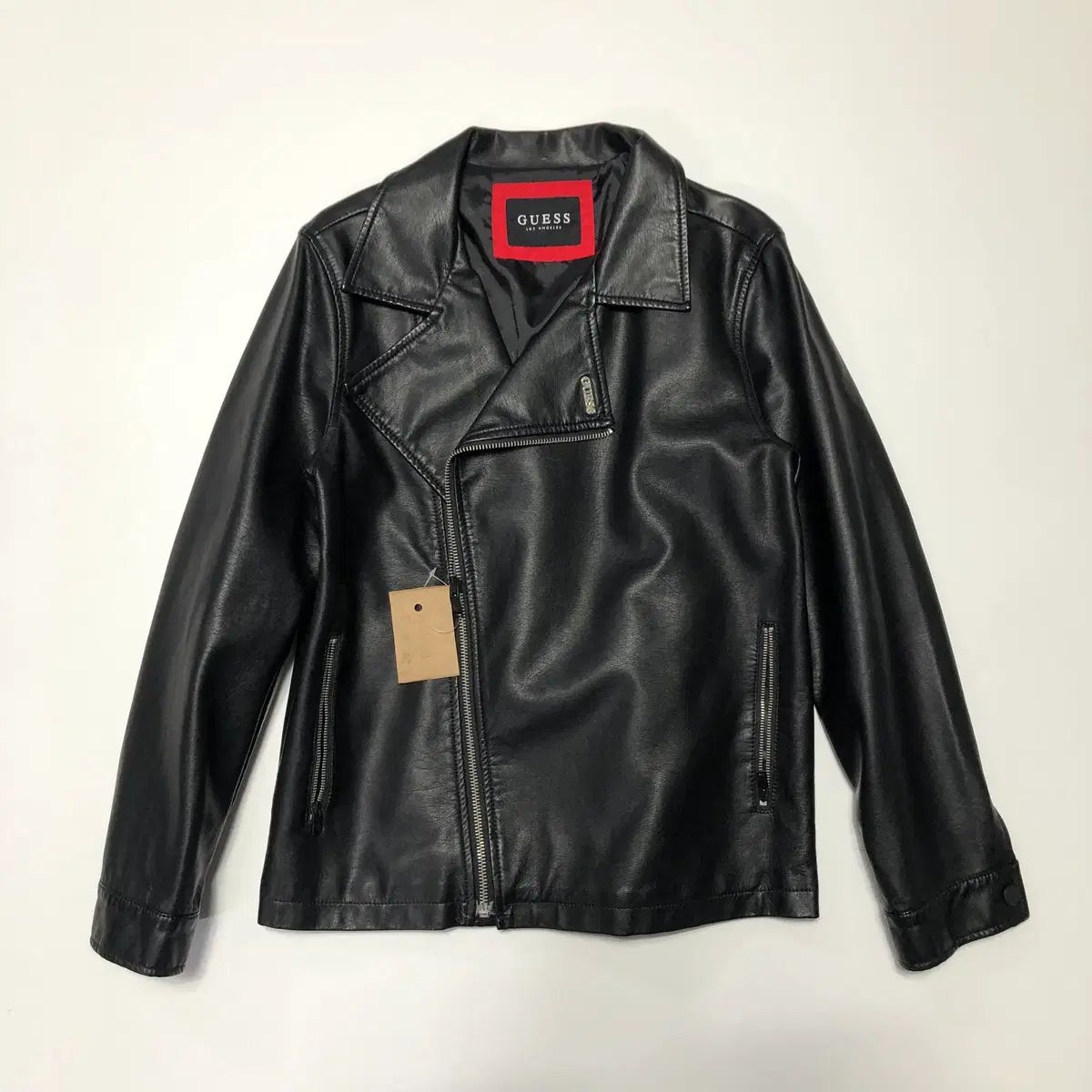 GUESS ライダースジャケット - メルカリ
