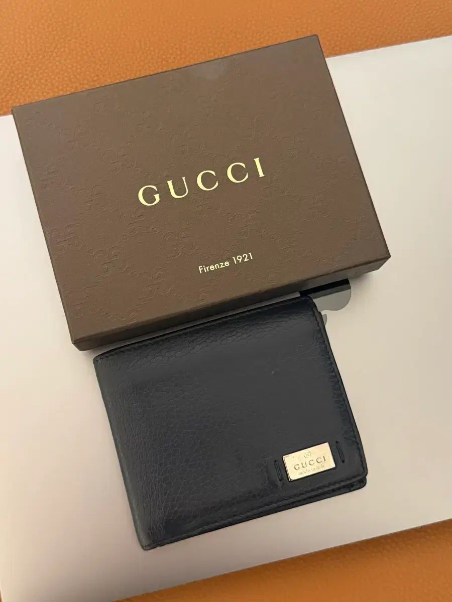 グッチ メンズ 二つ折り財布