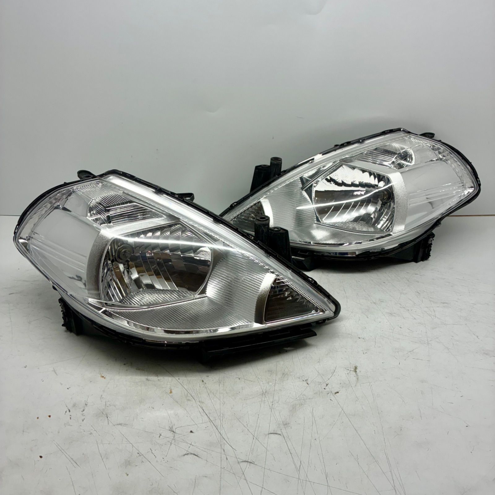 コーティング済】日産 C11 NC11 ティーダ 前期 ヘッドライト ランプ