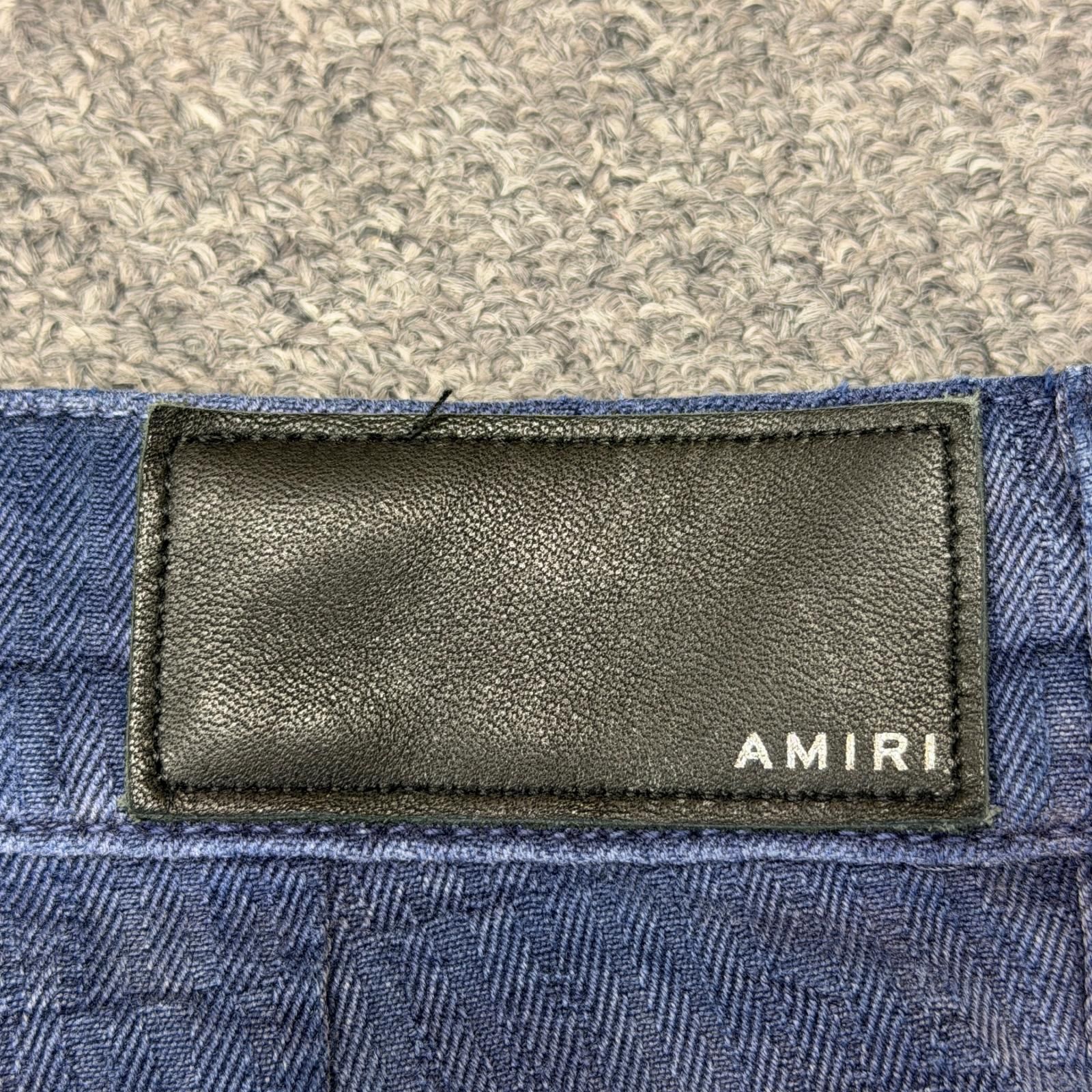 AMIRI Buggy Cargo 総柄ロゴ ワイドカーゴデニムパンツ デニムパンツ 