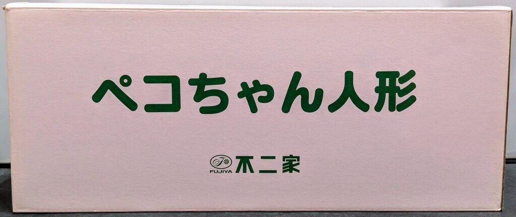 赤いバッグ持ち