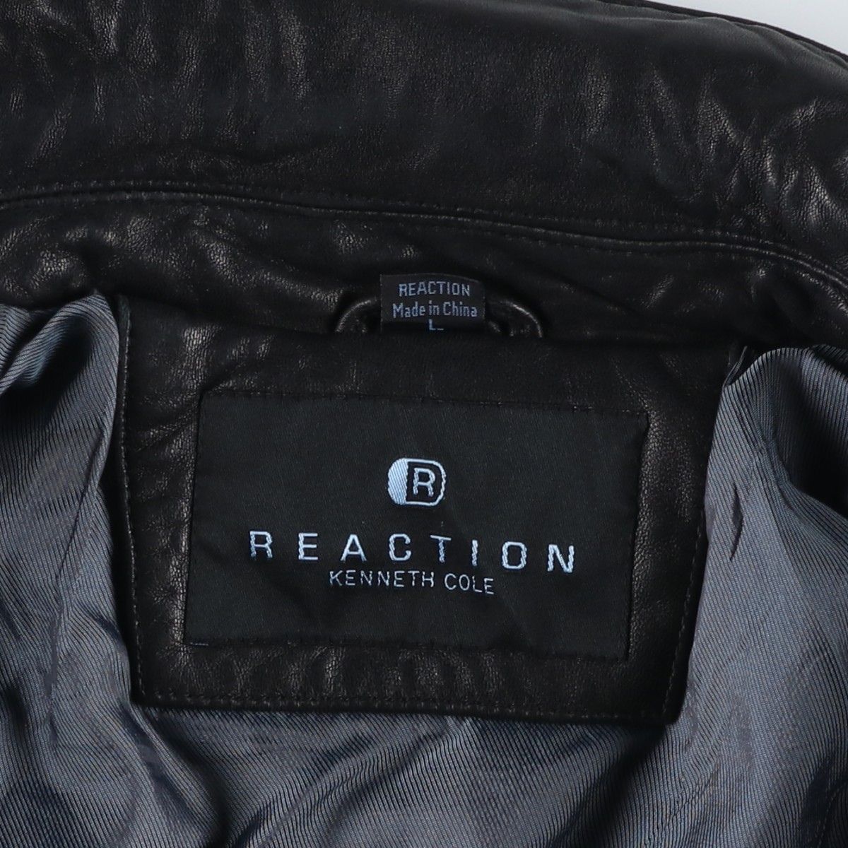 古着 REACTION スイングトップタイプ 中綿入り レザーブルゾン メンズL