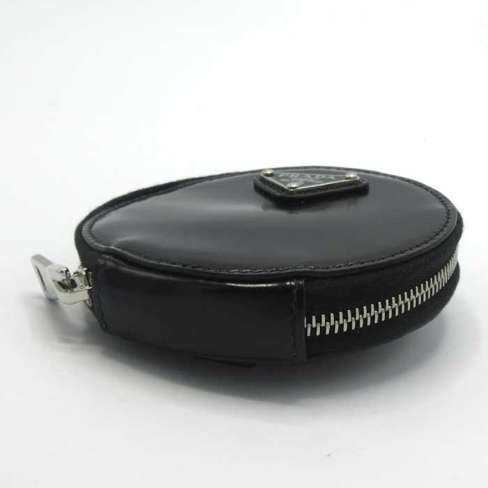 新品】プラダ ポーチ PRADA レザー 三角プレート ロゴ ナスカン付き