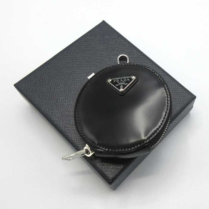 新品】プラダ ポーチ PRADA レザー 三角プレート ロゴ ナスカン付き