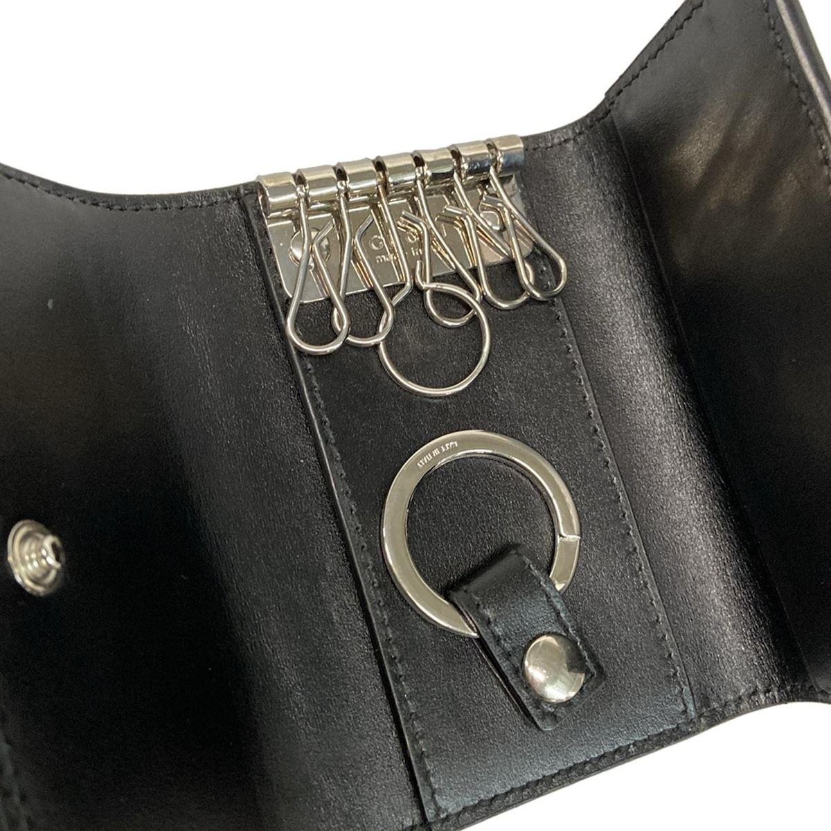 GUCCI(グッチ) キーケース GGエンボス 625565 黒 6連フック/キーリング