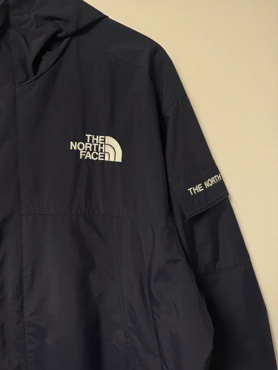 THE NORTH FACE ザノースフェイス フリー ポケット ロゴ ネイビ フード ウィンドブレーカー ウィンドストッパー XL