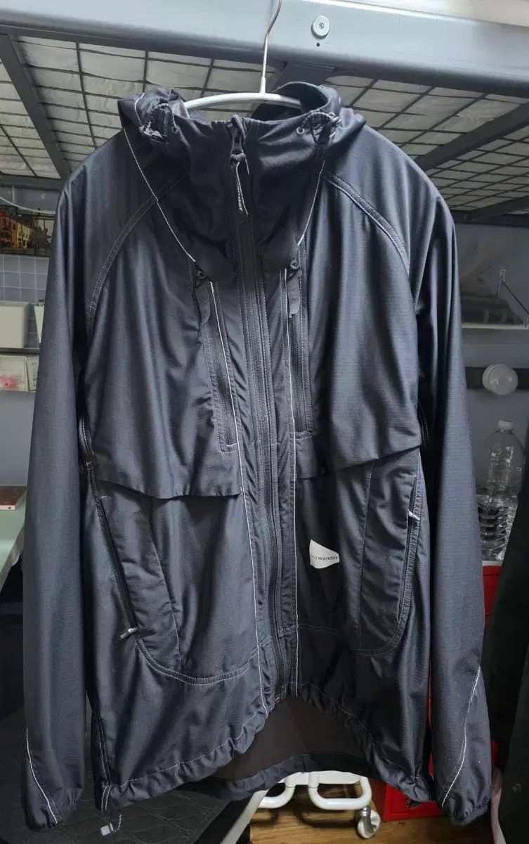 アンドワンダー ウィンドブレーカー ジャケット