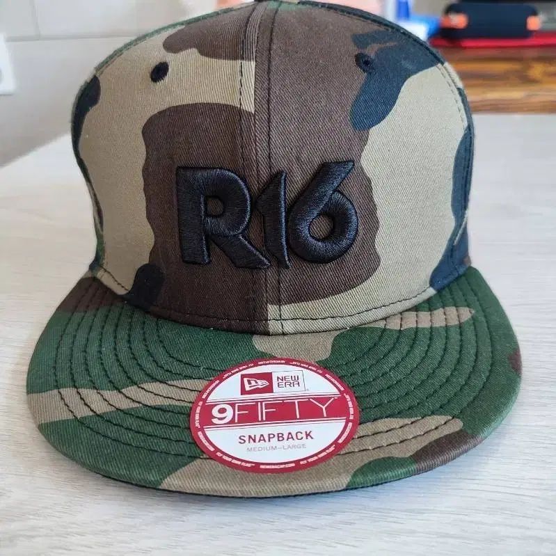 ニューエラ 9FIFTY スナップバック R16 カモ ミリタリー
