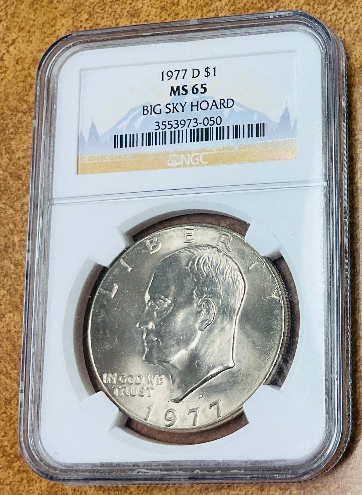 1977 年 D アイゼンハワー ドル、NGC Big Sky Hoard により MS 65 に