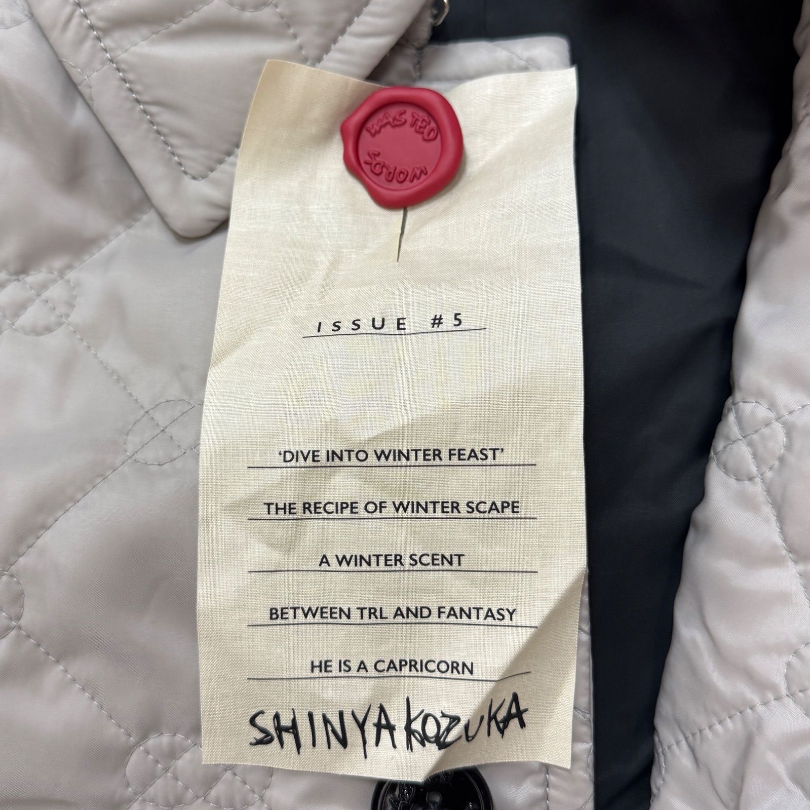 参考上代99000円 未使用 SHINYAKOZUKA  24AW PENCIL COAT WITH KAPOK KNOT  ペンシルコート キルティングコート シンヤコヅカ 2402SK06 グレー L （94908A5） 参考上代99000円 未使用 SHINYAKOZUKA 24AW PENCIL COAT WITH KAPOK