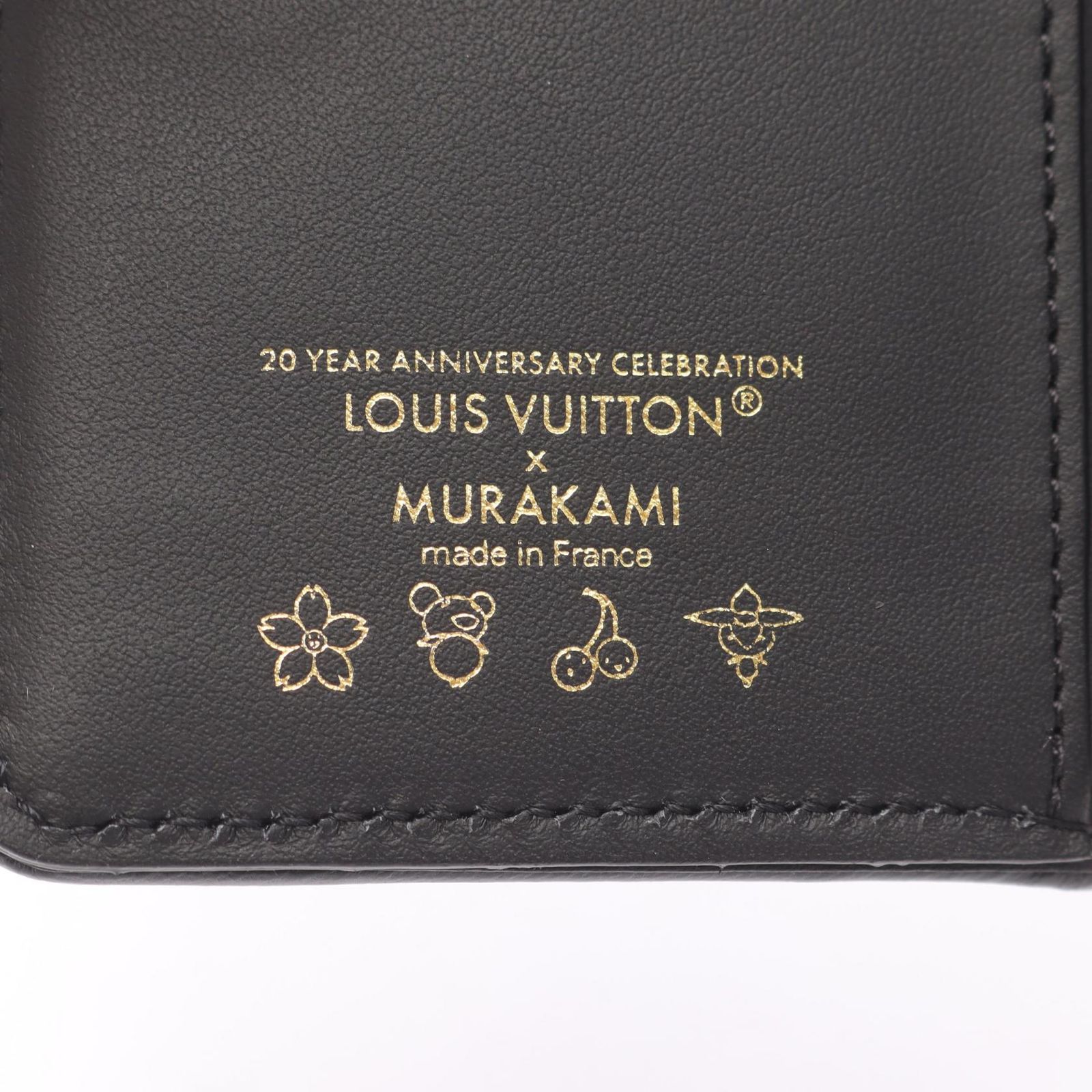 ルイ・ヴィトン LOUIS VUITTON 二つ折り財布 LV × TM ポルトフォイユ 