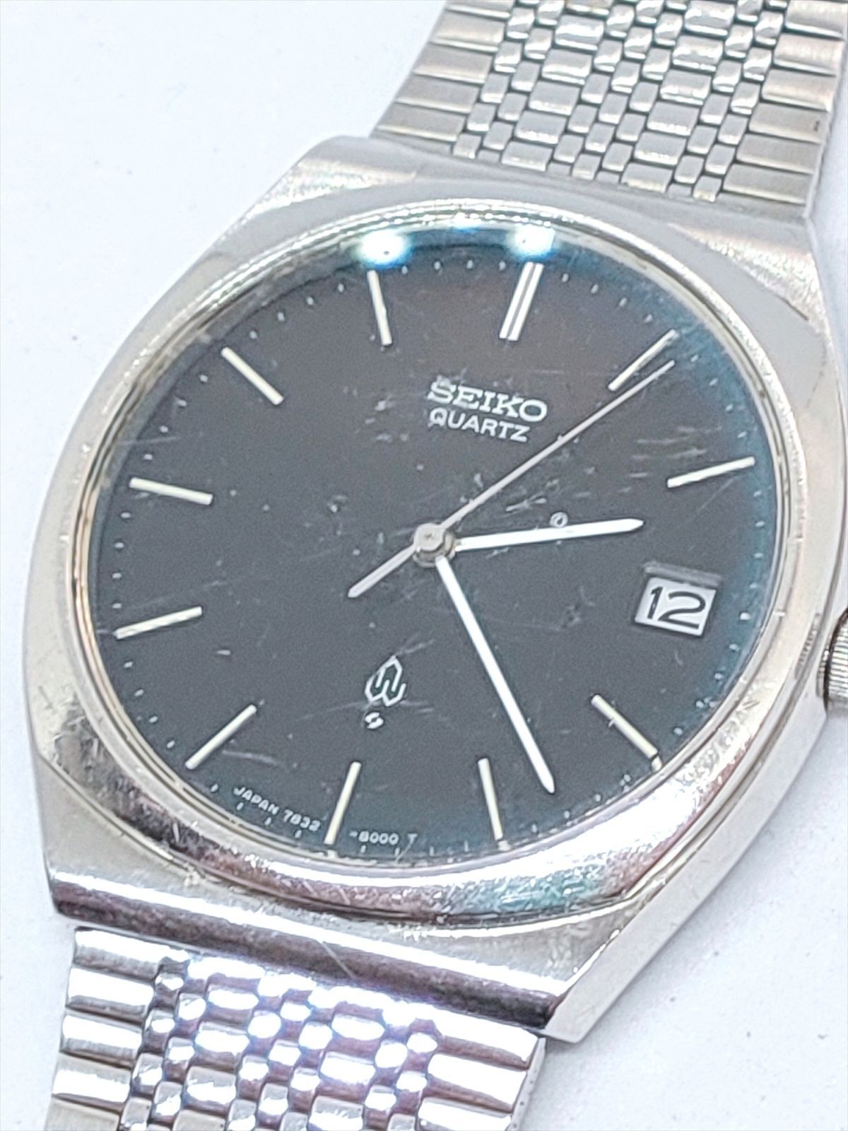 稼働品】SEIKO メンズ腕時計 デイトクオーツ黒文字盤 7832-8000 (3304 