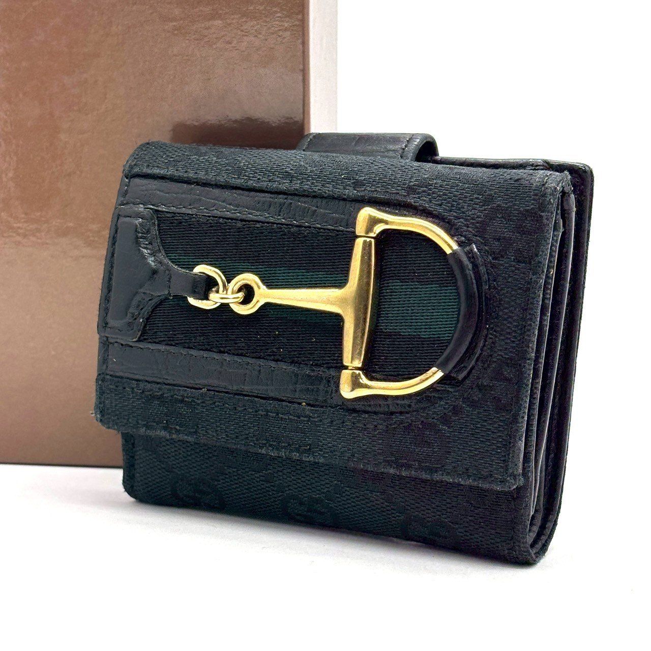 品格を仕込む黒】 GUCCI 二つ折り財布 GGキャンバス ホース 品格を仕込む黒】 GUCCI 二つ折り財布 GGキャンバス ホース