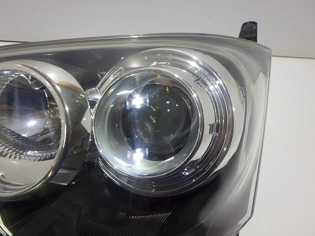 ムーヴカスタム 左ヘッドライト HID L175S L185S 前期 100-51867 81150