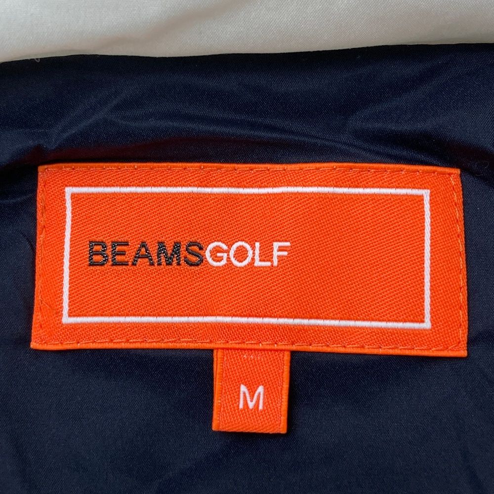 サイズ：M BEAMS GOLF ビームスゴルフ  フード付き中綿ジャケット ボア 切替  ネイビー系 [240101625601] ゴルフウェア レディース ストスト サイズ：M BEAMS GOLF ビームスゴルフ フード付き中綿ジャケット ボア