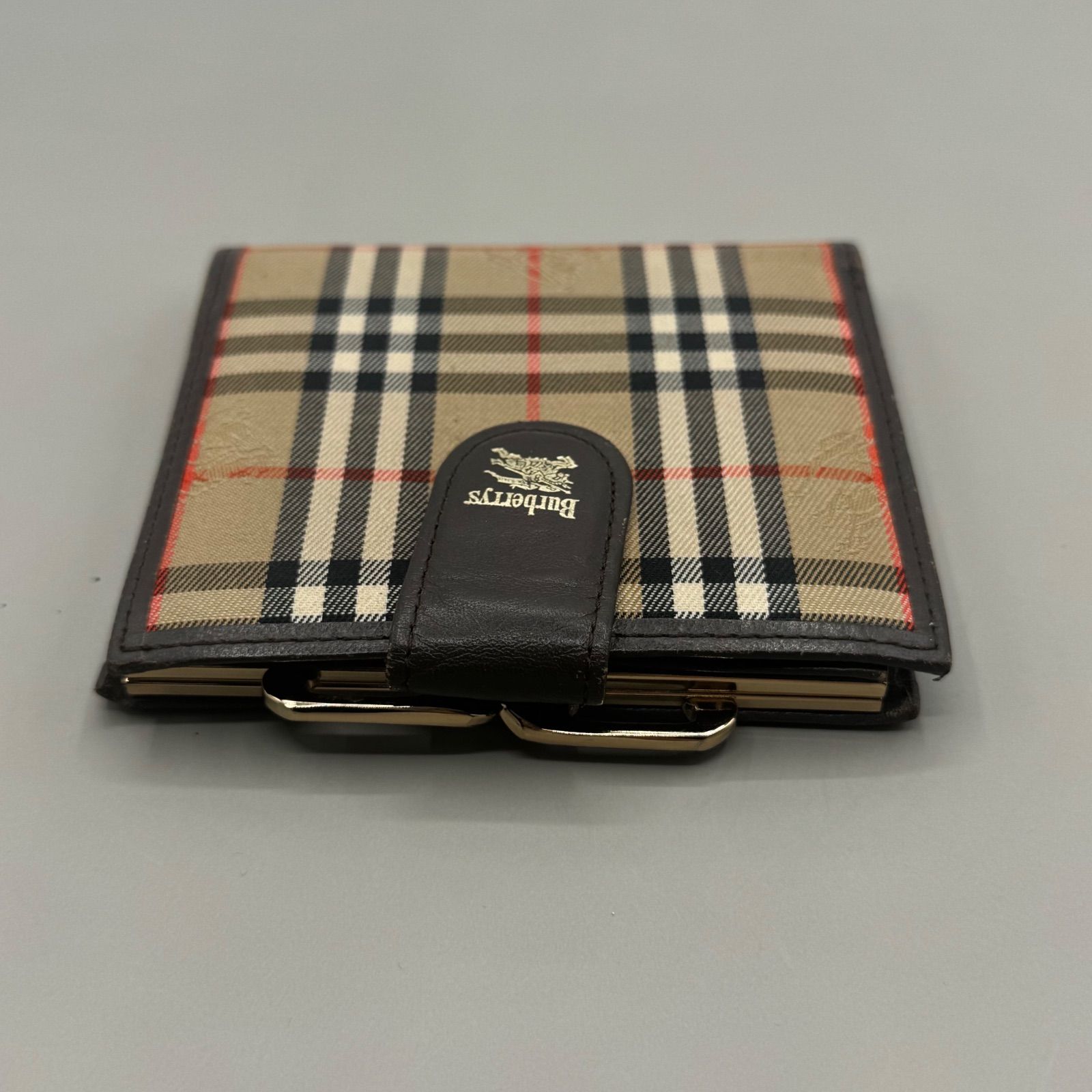 美品 バーバリー 二つ折り財布 がま口 ノバチェック シャドーホース