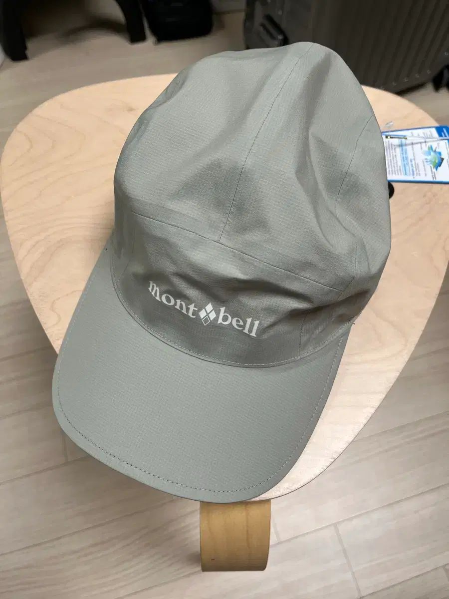 新品mont-bell モンベル レザー製ピスネーム付き ウォッシャブル ウールキャップ アウトドアにタウンユースに カーキ size M  56〜58cm モンベル カーキス ウール 帽子 M 新品