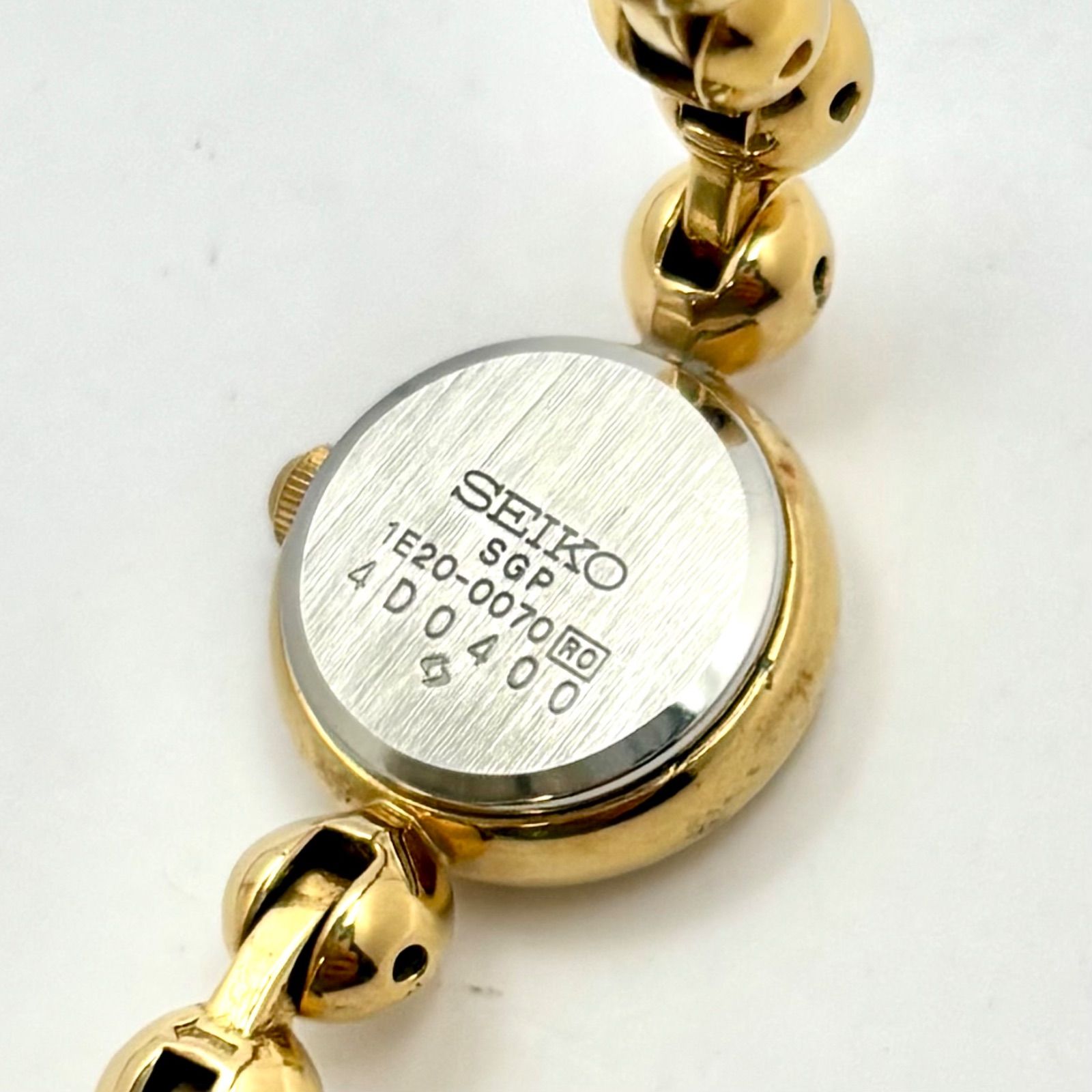 新品電池】SEIKO セイコー レディース 腕時計 ゴールド 1E20-0070